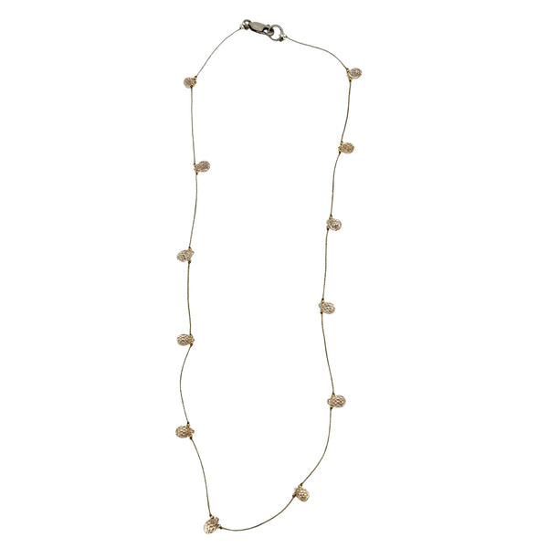Peach teardrop gemstone station necklace with faceted beads on thin gold chain