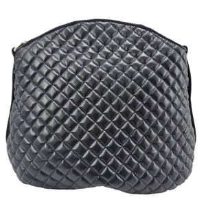 Quilted navy leather shoulder bag with diamond pattern, top zipper and side handles
