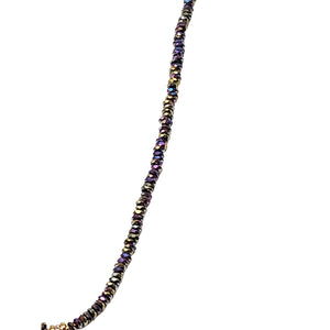 Multicolor beaded necklace strand with sparkly stones along the chain