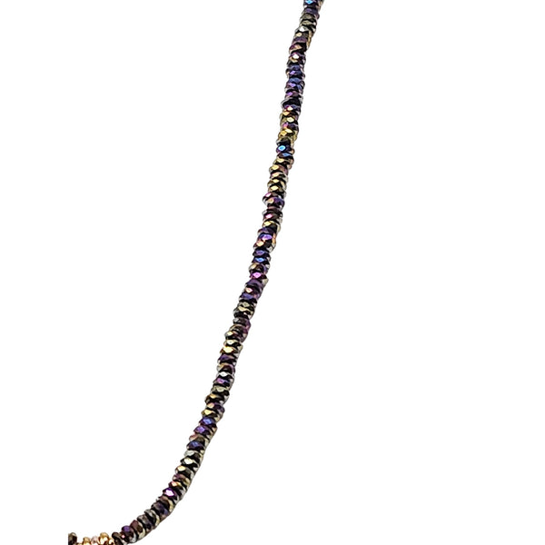 Multicolor beaded necklace strand with sparkly stones along the chain
