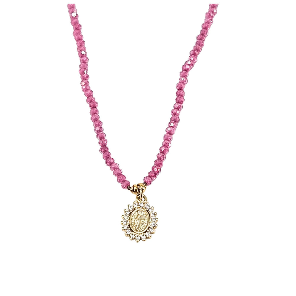 Pink beaded necklace with small silver clasp and gold round Mary pendant