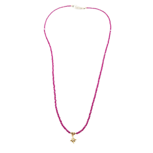 Pink beaded necklace with gold star charm and small top clasp