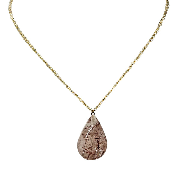 Teardrop brown rutilated gemstone pendant on slender gold-tone chain