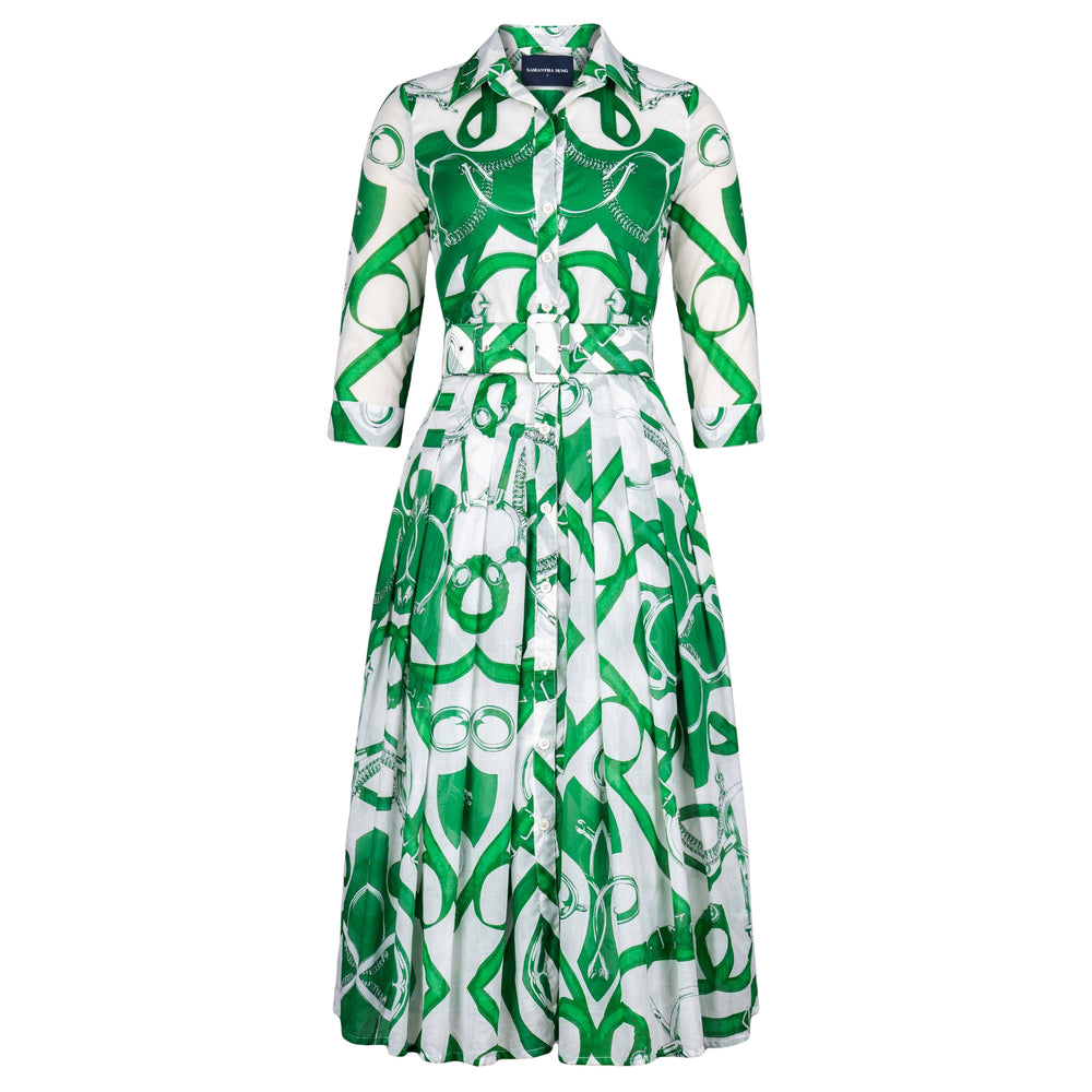 Green and white patterned long-sleeve dress with tie neck, fitted waist, pleated skirt
