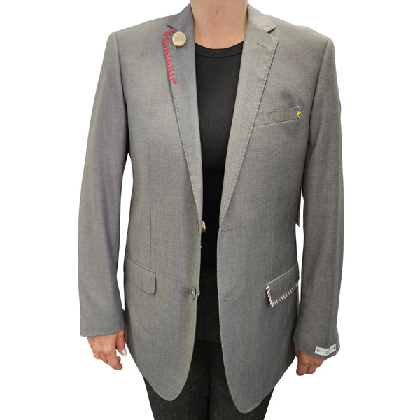 Grey blazer with notch lapels, front pockets, and small yellow sleeve accent