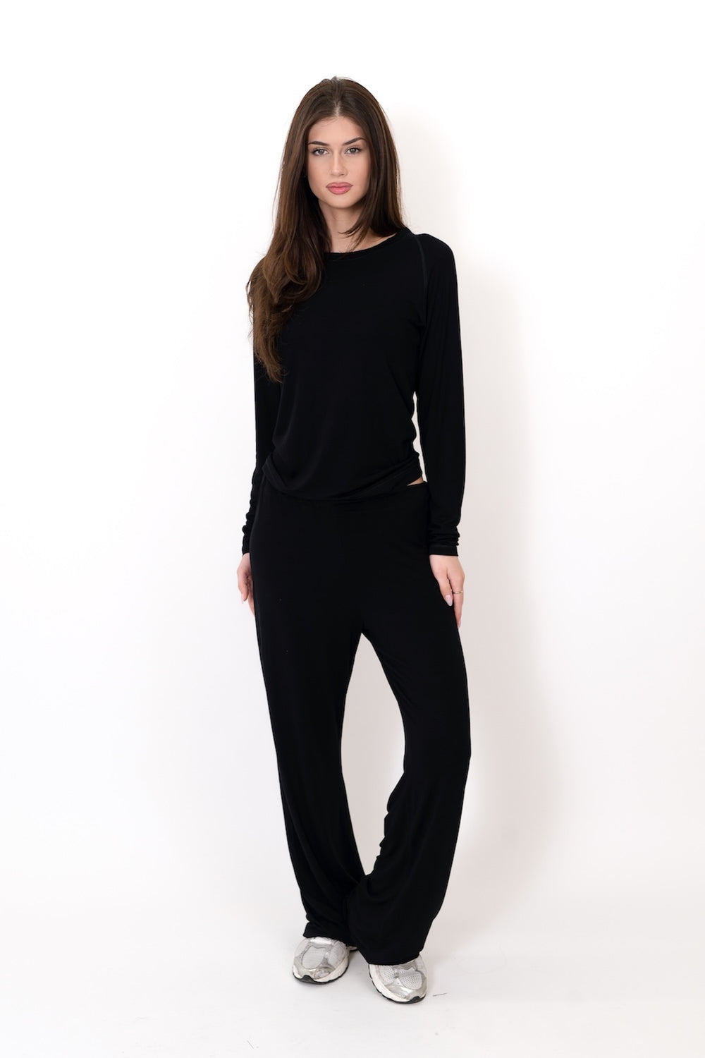 Black flow pants with elastic waistband and wide straight legs
