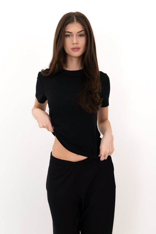 Black short-sleeve T-shirt with crew neck and draped hem