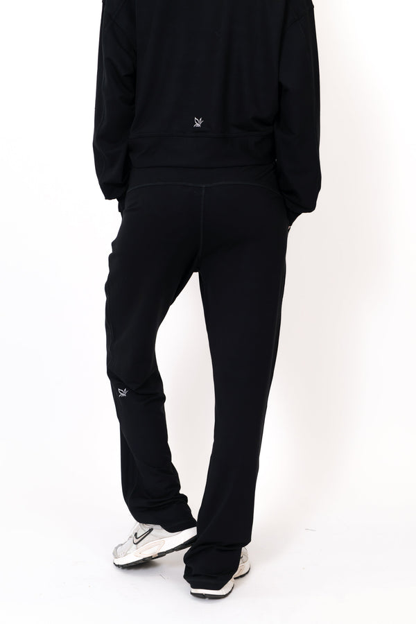 Black wide-leg sweatpants, relaxed legs with elastic waistband