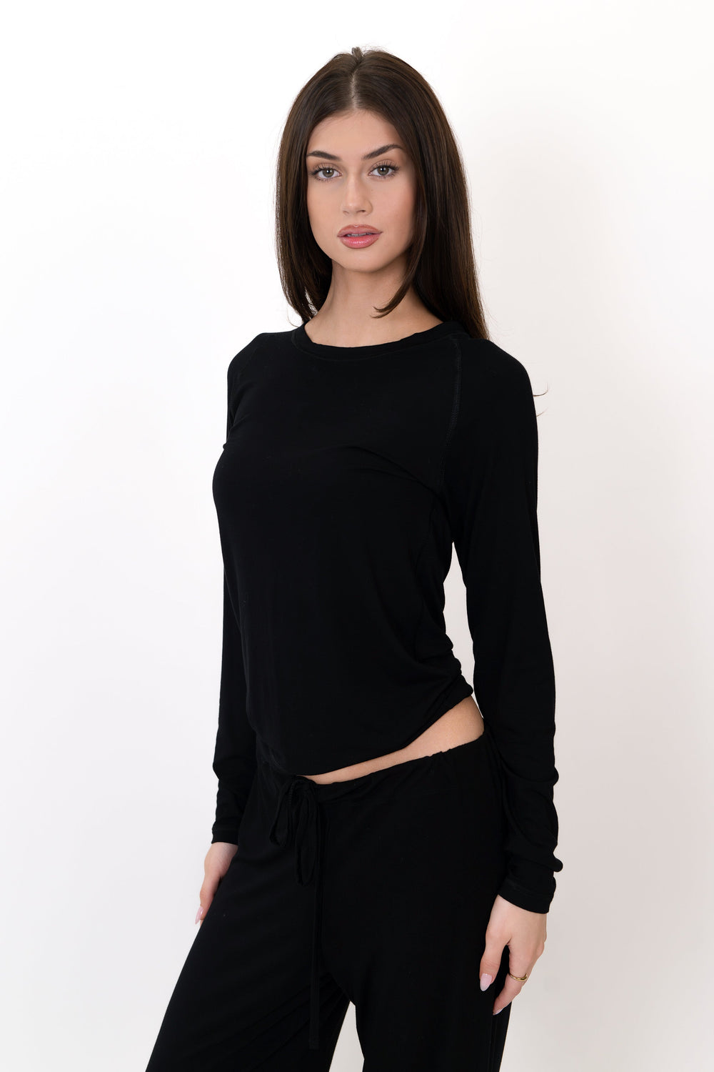 Black long-sleeve crop top with round neckline