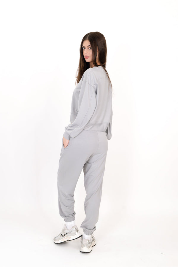 Gray sweatpants, side view, elastic waist with tapered leg