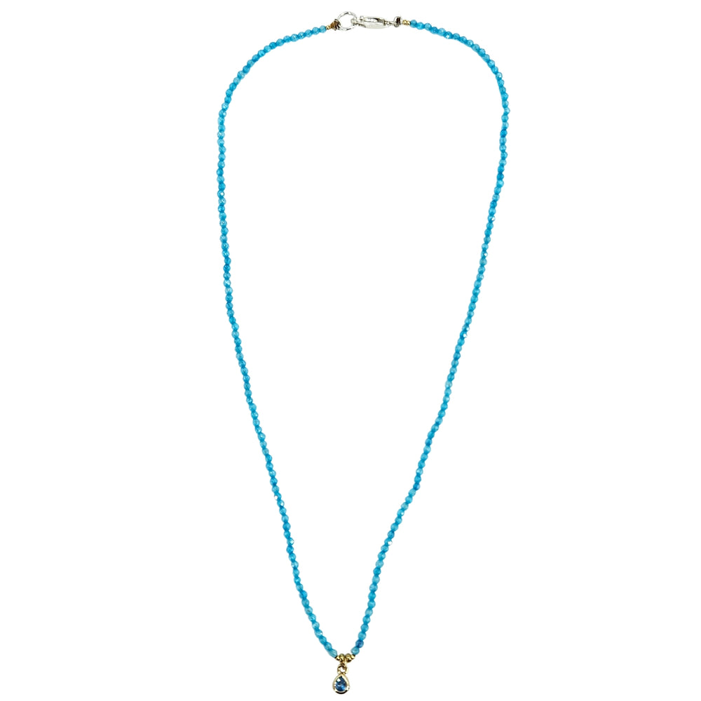 Turquoise beaded charm necklace with goldtone teardrop pendant and lobster clasp