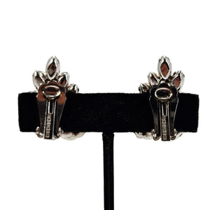 Silver-tone stud earrings with clear rhinestone and pearl floral settings, bar-style backs