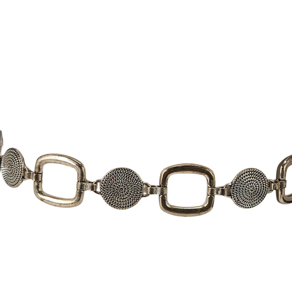 Silver-toned chain belt with square links and textured circular medallion beads