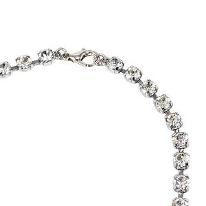 Rhinestone tennis-style necklace with round stones and silver-tone toggle clasp
