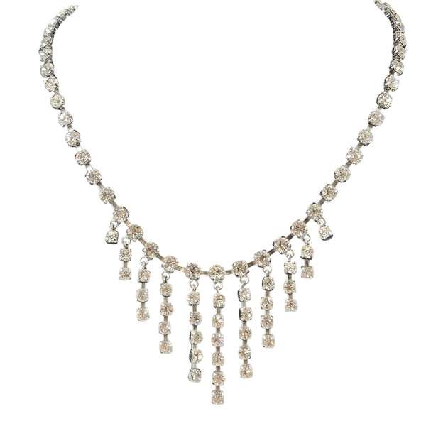 Rhinestone centerpiece necklace with curved neckline and multi-row fringe drop