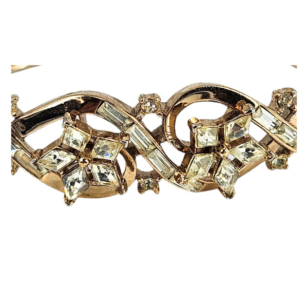 Gold rhinestone bracelet close-up with linked marquise and round crystal settings