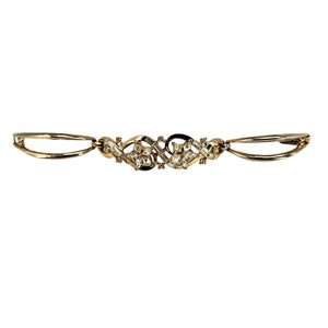Gold rhinestone bracelet with hinged clasp and three central crystal flower clusters