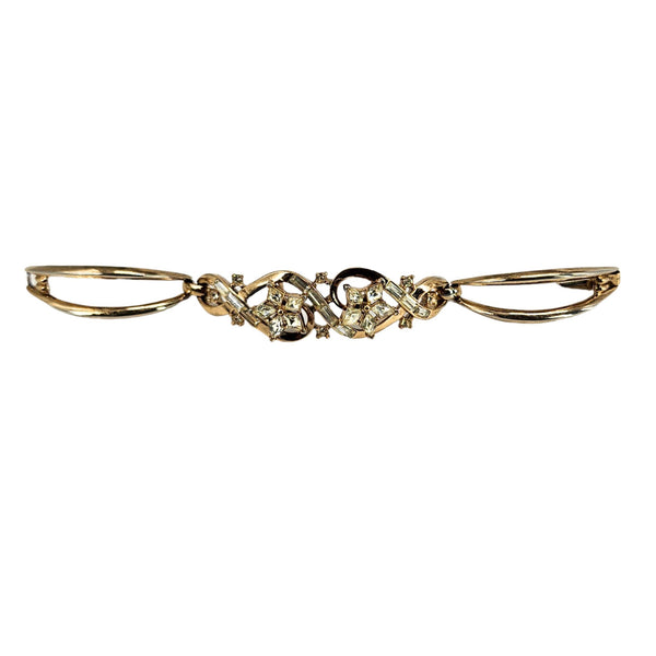 Gold rhinestone bracelet with hinged clasp and three central crystal flower clusters