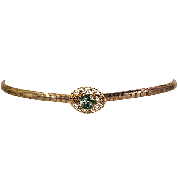 Gold-tone stretch snake chain bracelet with round filigree green gemstone clasp