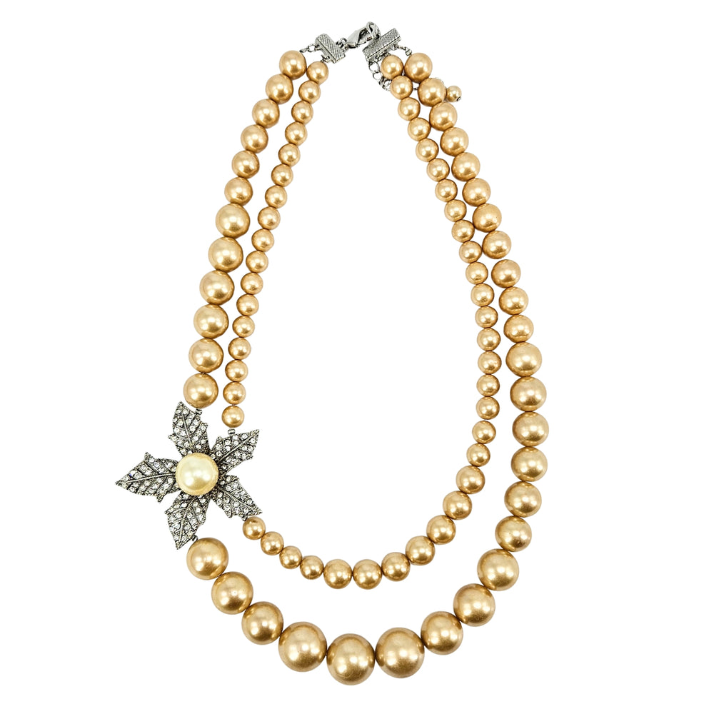 Vintage faux pearl flower necklace with gold-tone beads and rhinestone starburst pendant