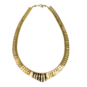 Gold vintage-style collar necklace with textured links and fringe detail