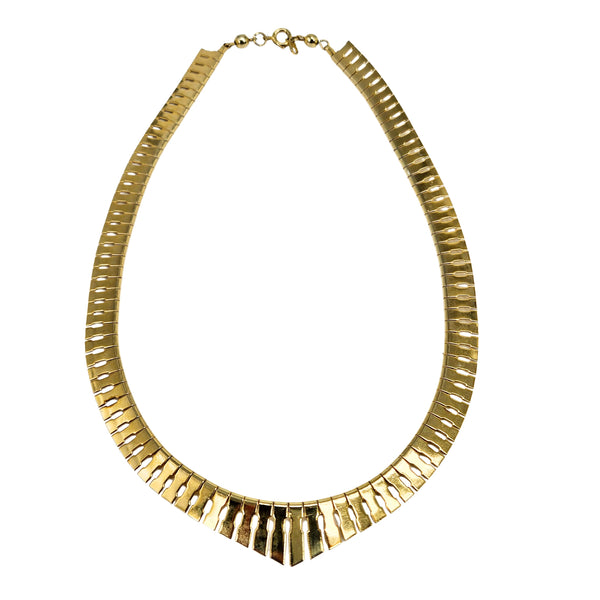 Gold vintage-style collar necklace with textured links and fringe detail