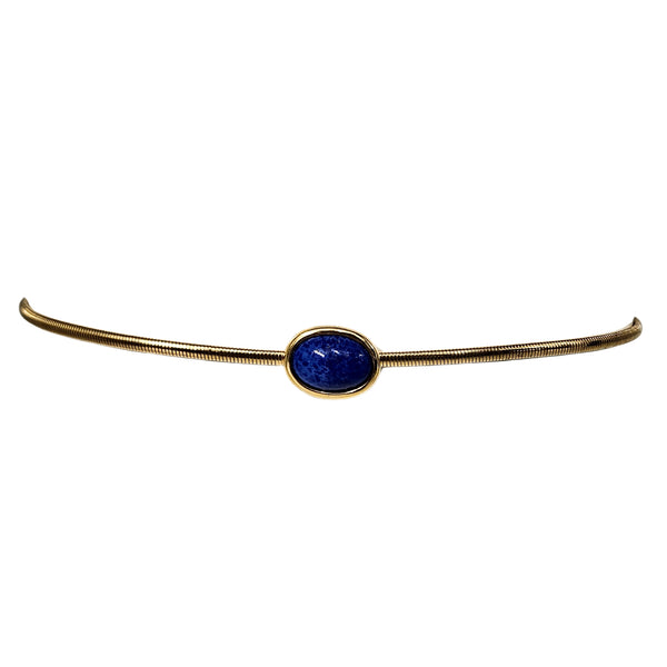 Gold stretch belt with blue oval stone centerpiece, thin flexible band