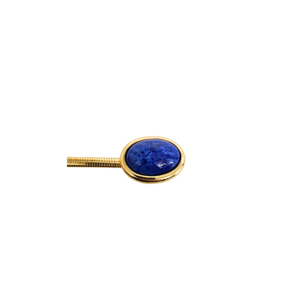 Gold stretch belt end with round blue stone set in gold bezel