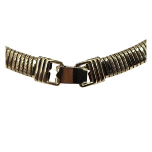 Gold textured collar necklace with square clasp and ribbed metal band ends