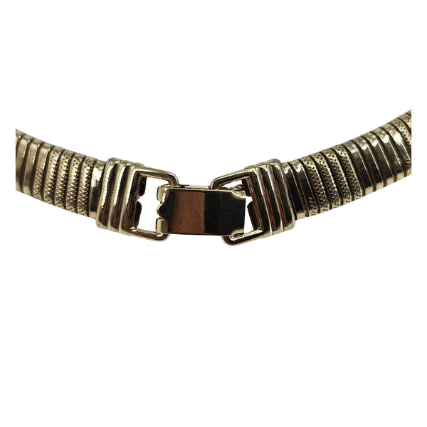 Gold textured collar necklace with square clasp and ribbed metal band ends