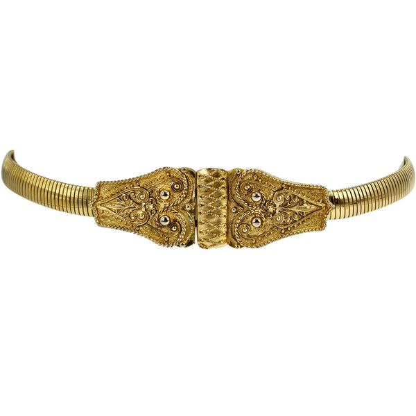 Gold stretch snake-chain belt with decorative filigree clasp and textured center