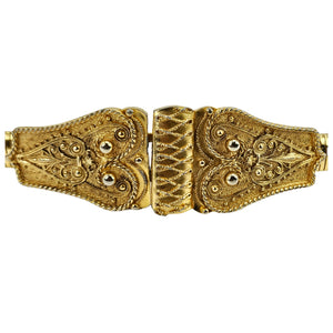 Gold filigree belt buckle with textured center clasp on snake-chain strap