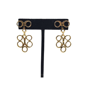 Gold tone dangle earrings on black card, circle links with top rings