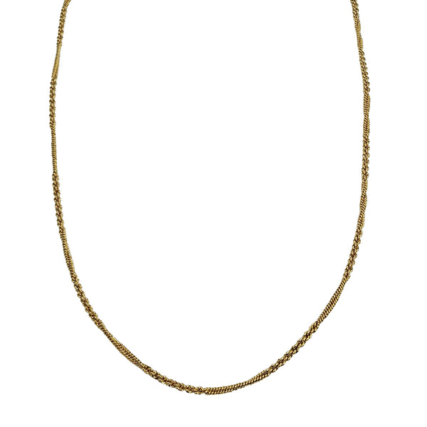 Gold chain necklace with fine curb links, curved around the neckline