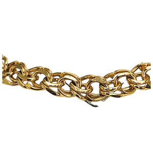 Gold chain choker necklace close-up of shiny oval link detail