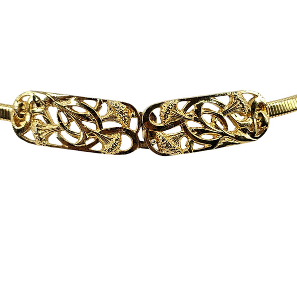 Gold filigree buckle on vintage costume belt with elastic stretch strap.