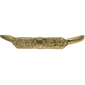 Gold stretch belt with decorative filigree center bar and ribbed metal-like ends