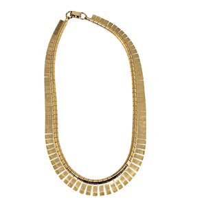 Gold-tone collar necklace with segmented rows and linked chain clasp, oval bib shape