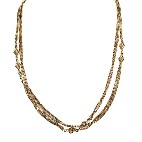 Gold-tone double Cuban chain necklace, V-shaped drape with repeating star station links