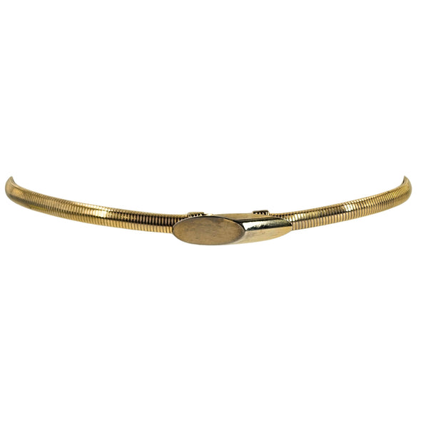 Gold-tone stretch snake chain belt shown curved open, with oval clasp centered.