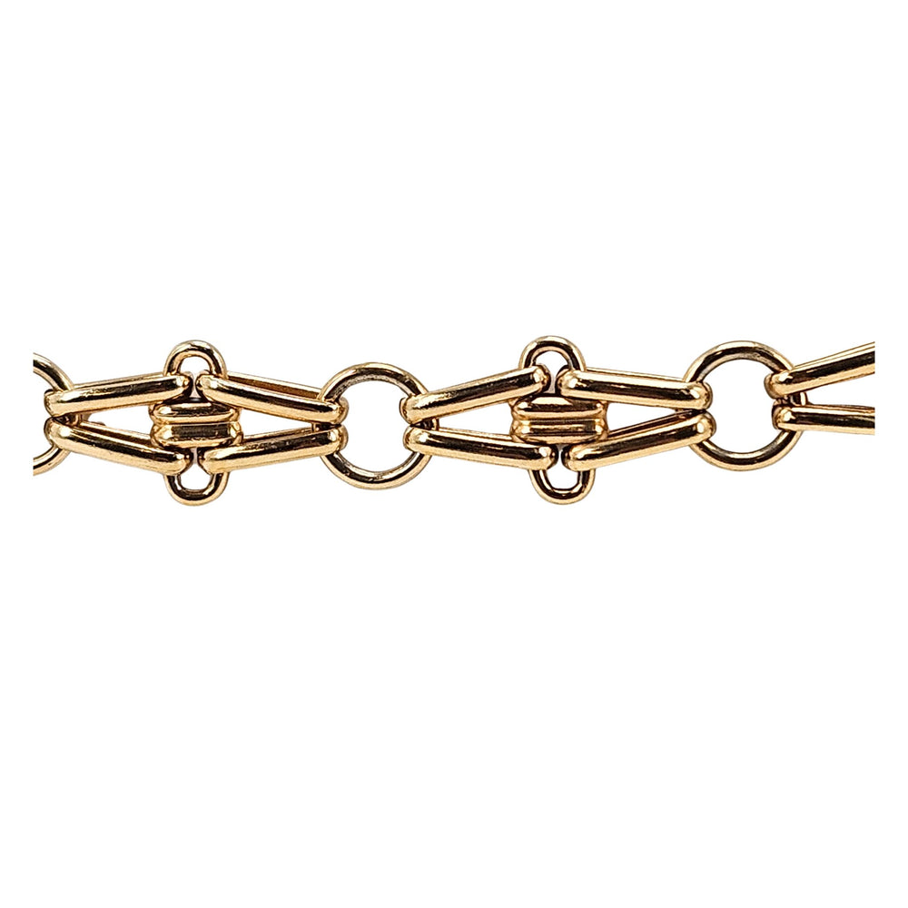 Gold vintage chain belt with interlocking links and round coin charm
