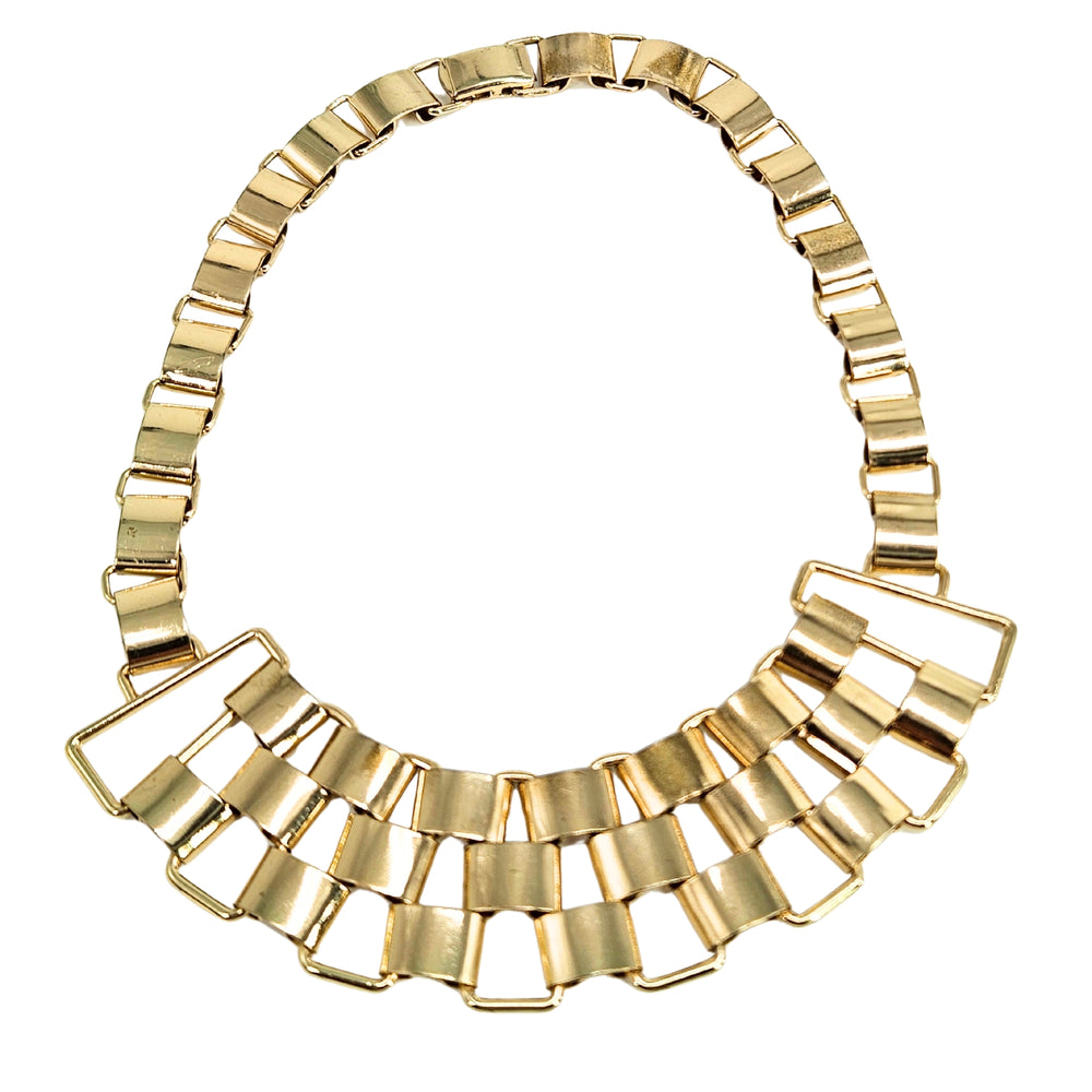 Gold-tone geometric link bib necklace with sculpted rectangular chain links