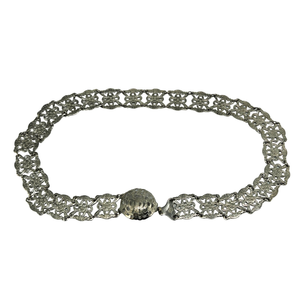 Silver filigree chain belt with ornate floral panel links and round clasp