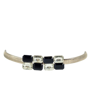 Silver tone stretch belt with rhinestone buckle and alternating black and clear stones
