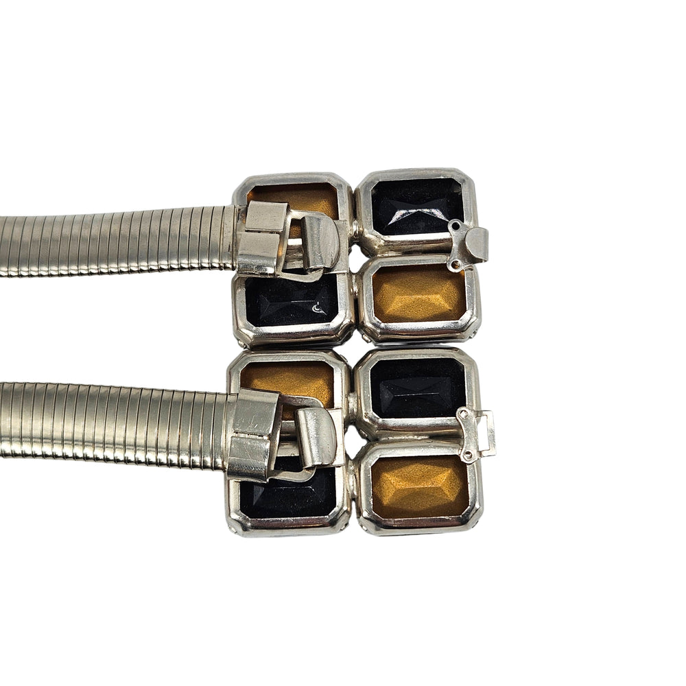 Silver tone stretch belt with rhinestone buckle, black and clear square stones