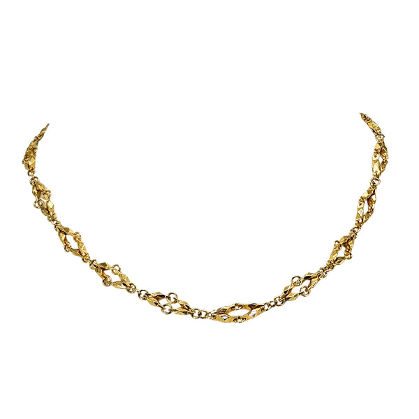Gold diamond-link chain necklace, curved drape with faceted marquise-style links
