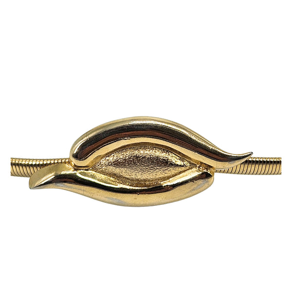 Gold oval snake buckle centerpiece on stretch skinny belt, close-up