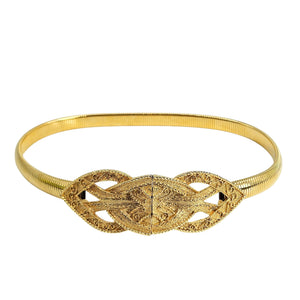 Gold stretch belt with ornate interlocking filigree buckle
