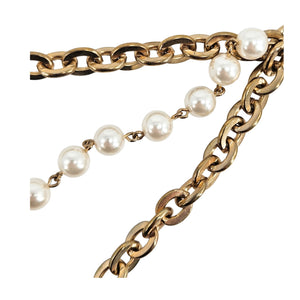 Gold chain belt with curb links and faux pearl drops along the edge