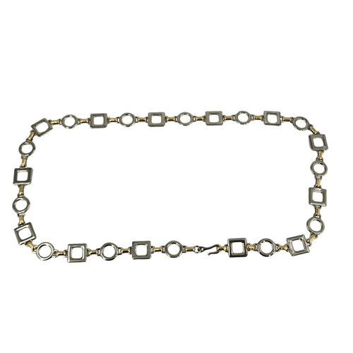 Silver-tone chain belt with alternating open square and round links.